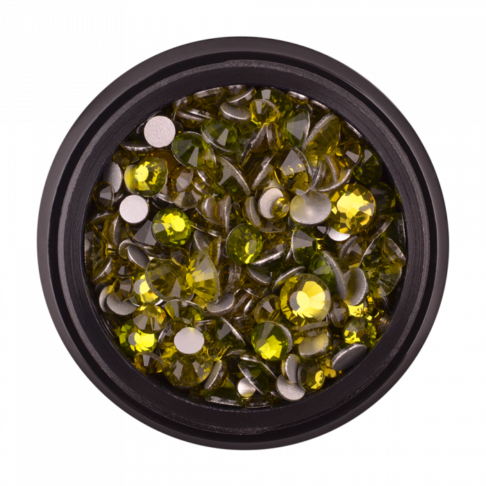 Strasszkő 22 olivine:Műkörömbe építhető vagy a felületére ragasztható strasszkövek....