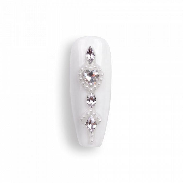 Strasszkő - 0051:Fedezd fel a különleges műköröm díszek világát, ahol a részletek valóban...